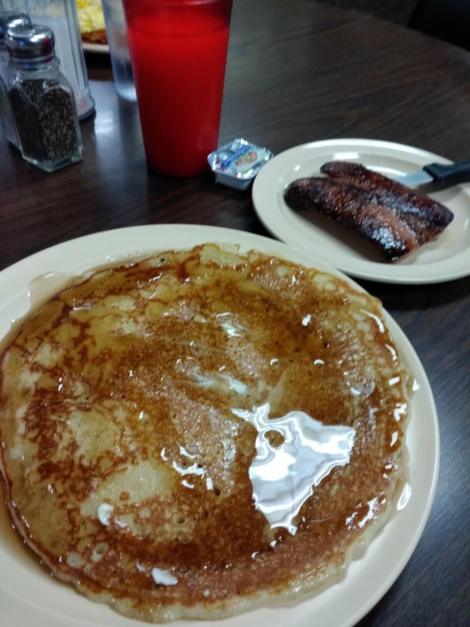 Southern comfort food served on white plates.